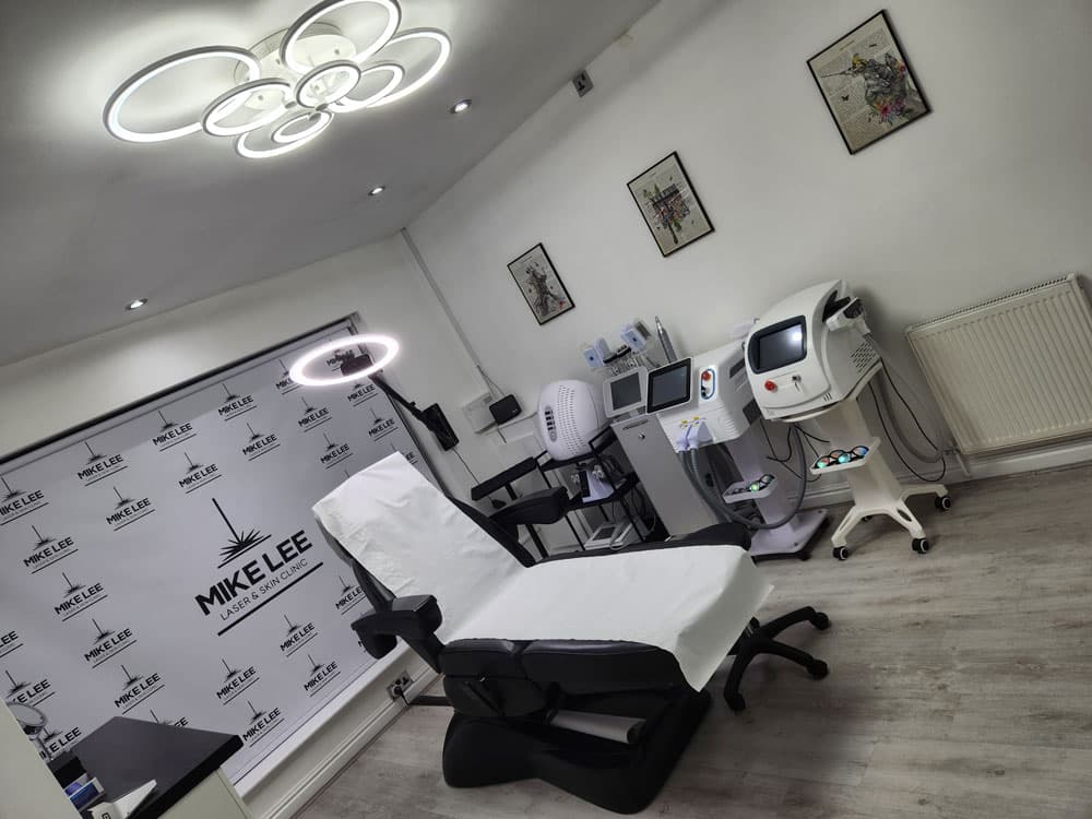 Treatment room with a couch and laser equipment