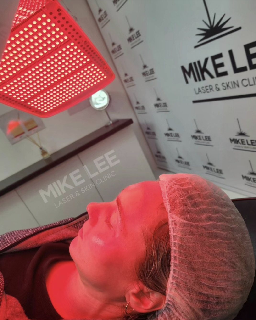 A client having LED light therapy at the clinic at Mike Lee Laser & Skin Clinic